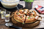 Homemade pizza made with dough prepared in the D'BakerAid system